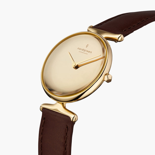 UN28GOLEDBPM UN32GOLEDBPM &Unika ladies leather strap watches - polished metal dial - gold case - dark brown leather strap